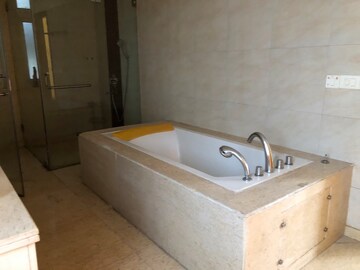 Bathroom in 5 BHK Apartment at Emaar The Palm Springs, Sector 54 – for Rent