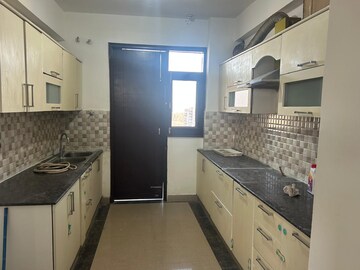Kitchen in 4 BHK Apartment at Hanumant Bollywood Heights, Dhakoli Village – for Sale