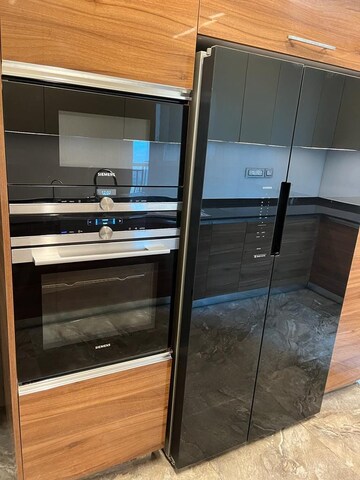 Kitchen in 4 BHK Apartment at DLF The Crest, Sector 54 – for Rent