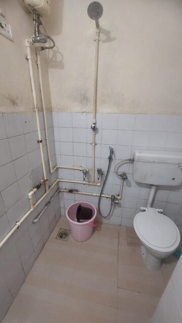 Bathroom in 2 BHK Apartment at Kshitij CHS, Goregaon East – for Rent