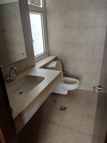 Bathroom in 3 BHK Apartment at Emaar The Palm Springs, Sector 54 – for Rent