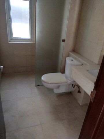 Bathroom in 3 BHK Apartment at Emaar The Palm Springs, Sector 54 – for Rent