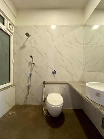 Bathroom in 3 BHK Apartment at Omkar Alta Monte, Malad East – for Sale