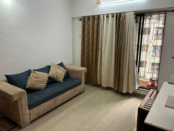 Living Room in 1 BHK Apartment at Royal Nest Malad West, Malad West – for Rent