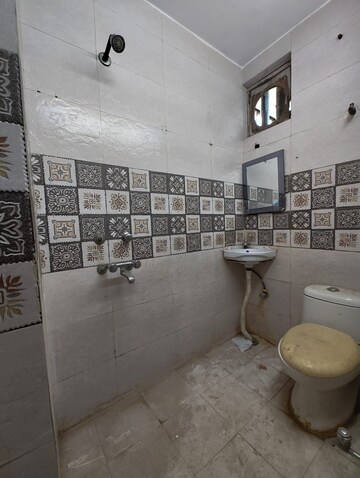 Bathroom in 2 BHK Builder Floor at Kalkaji – for Rent