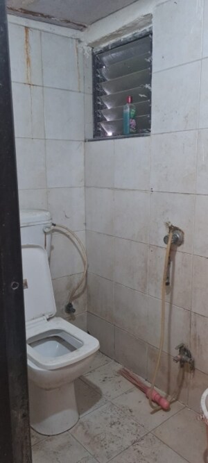 Bathroom in 2 BHK Apartment at New Mhada Towers, Andheri West – for Sale