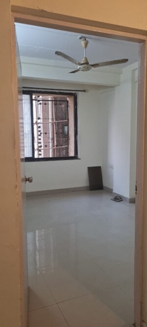 Room in 2 BHK Apartment at New Mhada Towers, Andheri West – for Sale