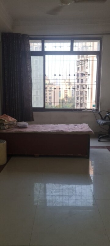 Bedroom in 2 BHK Apartment at New Mhada Towers, Andheri West – for Sale