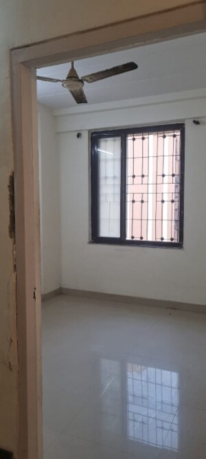 Room in 2 BHK Apartment at New Mhada Towers, Andheri West – for Sale