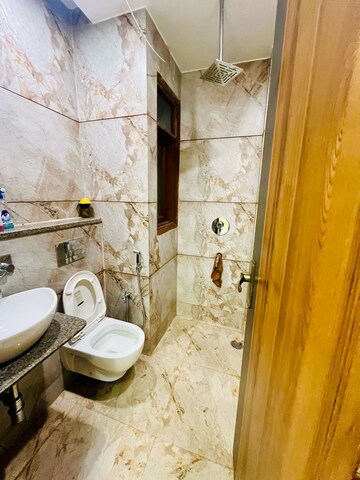 Bathroom in 3 BHK Builder Floor at Dwarka Mor – for Rent