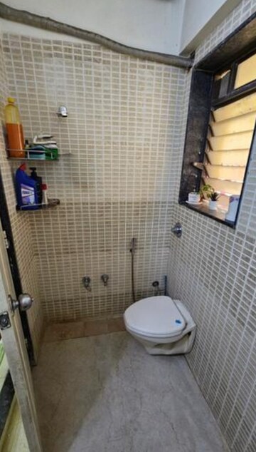 Bathroom in 2 BHK Apartment at Varun Garden, Ghodbunder Road – for Rent