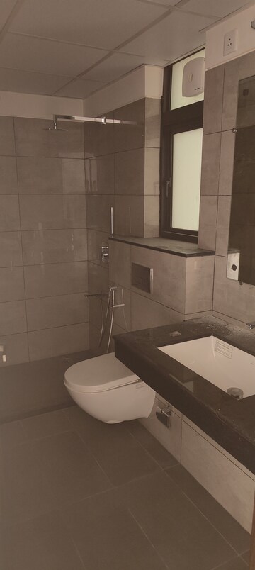 Bathroom in 4 BHK Apartment at Adani Samsara Vilasa, Sector 63 – for Rent