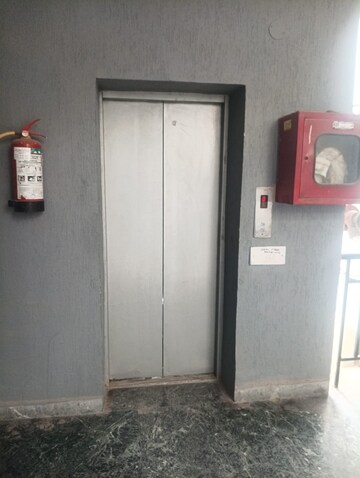Building Lobby in 2 BHK Apartment at Green Valley Heights, Dhakoli Village – for Sale