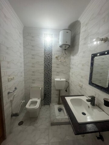 Bathroom in 3 BHK Builder Floor at RWA Residential Society Sector 46, Sector 46 – for Rent
