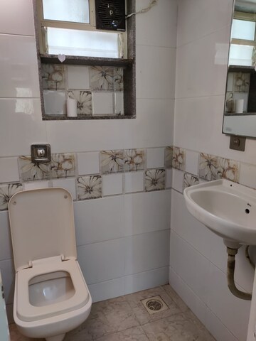 Bathroom in 1 BHK Apartment at Patliputra Building, Andheri West – for Rent