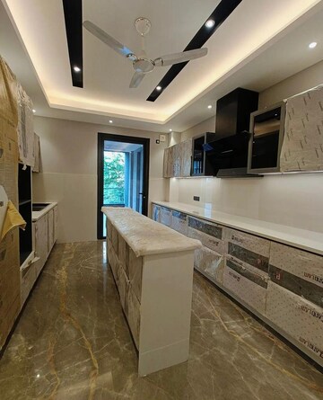 Kitchen in 4 BHK Builder Floor at Infinite Luxury, South City 2 – for Rent