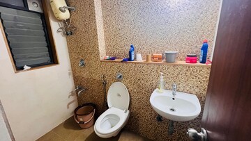 Bathroom in 1.5 BHK Apartment at Lodha Lakeshore Greens, Dombivli East – for Rent