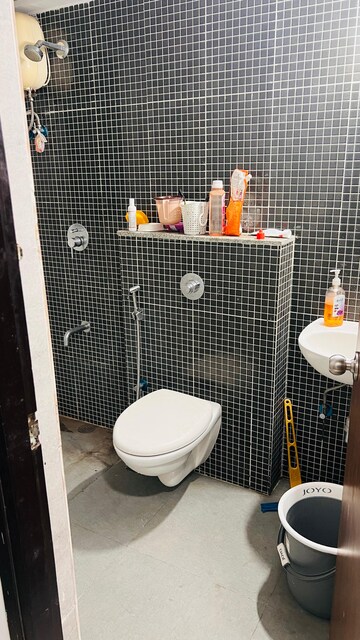 Bathroom in 1.5 BHK Apartment at Lodha Lakeshore Greens, Dombivli East – for Rent
