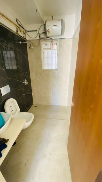 Bathroom in 2 BHK Apartment at Dosti West County Phase 4 Dosti Pine, Balkum Pada – for Rent