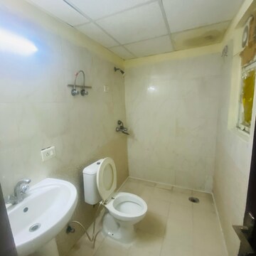 Bathroom in 2.5 BHK Apartment at Aims Golf City, Noida Central – for Rent