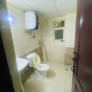 Bathroom in 2.5 BHK Apartment at Aims Golf City, Noida Central – for Rent