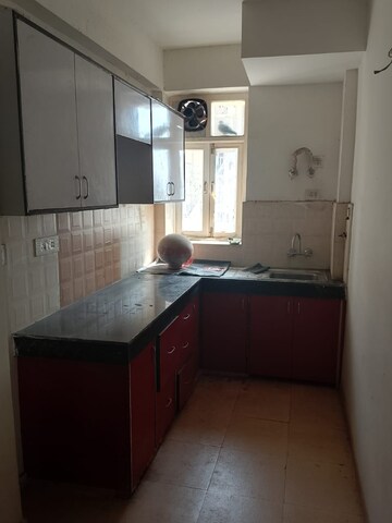 Kitchen in 2 BHK Apartment at Krish Aura, Alwar Bypass Road – for Rent