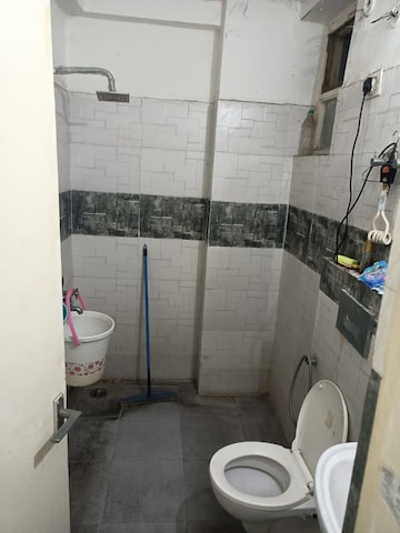 Bathroom in 2 BHK Apartment at Krish Aura, Alwar Bypass Road – for Rent