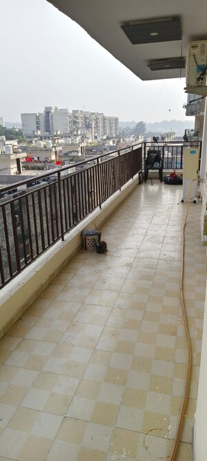 Balcony in 2 BHK Apartment at Green Valley Heights, Dhakoli – for Sale