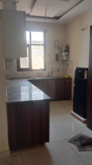 Kitchen in 2 BHK Builder Floor at Dhakoli Village – for Sale