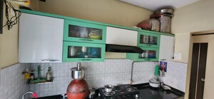 Kitchen in 1 BHK Apartment at Rosa Gardenia, Ghodbunder Road – for Sale