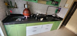 Kitchen in 1 BHK Apartment at Rosa Gardenia, Ghodbunder Road – for Sale