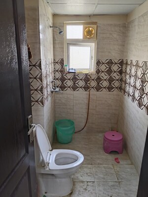 Bathroom in 2 BHK Apartment at Aims Greens Avenue, Sector 4, Greater Noida – for Sale