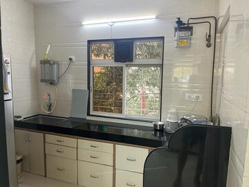 Kitchen in 2 BHK Apartment at Aman CHS Malad East, Malad East – for Rent