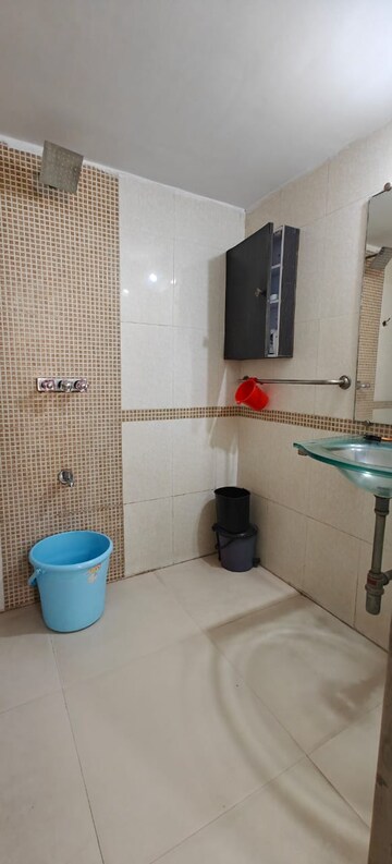 Bathroom in 3 BHK Apartment at Dedhia Palatial Height, Powai – for Rent