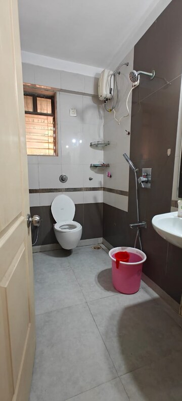 Bathroom in 3 BHK Apartment at Dedhia Palatial Height, Powai – for Rent