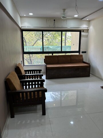 Living Room in 2 BHK Apartment at Dharamraj CHS, Malad West – for Rent