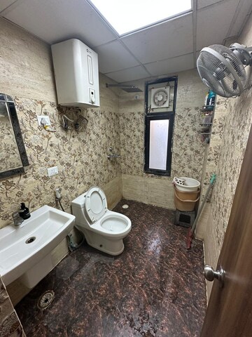 Bathroom in 2.5 BHK Apartment at Charms Castle, Raj Nagar Extension – for Rent