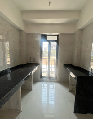 Kitchen in 1 BHK Apartment at Leena Bhairav Residency, Kanakia Road – for Sale