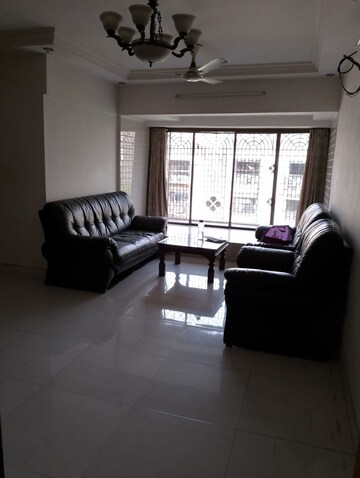 Living Room in 1 BHK Apartment at Twin Tower, Andheri West – for Rent