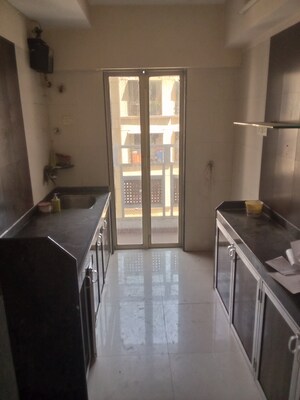 Kitchen in 1 BHK Apartment at M R Galaxy Royale, Goregaon West – for Sale