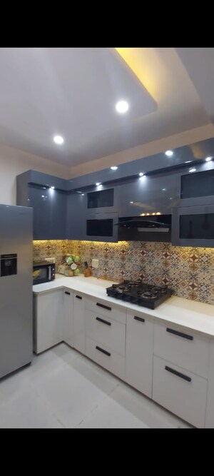 Kitchen in 2.5 BHK Apartment at Charms Castle, Raj Nagar Extension – for Sale