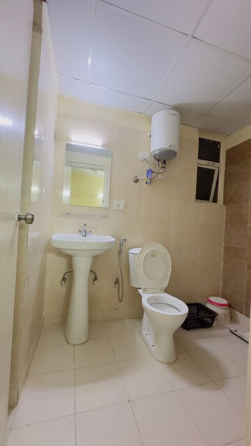 Bathroom in 1 RK Apartment at Habitech Panch Tatva, Tech Zone 4 Greater Noida – for Rent