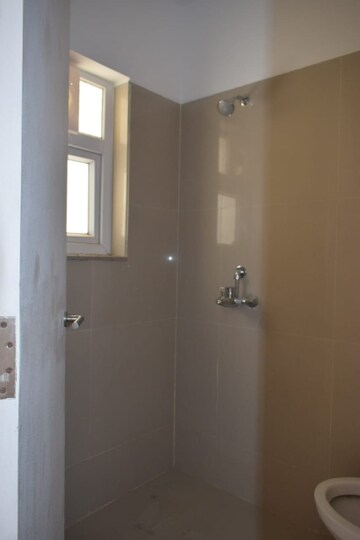 Bathroom in 3 BHK Apartment at Emaar Gurgaon Greens, Sector 102 – for Sale