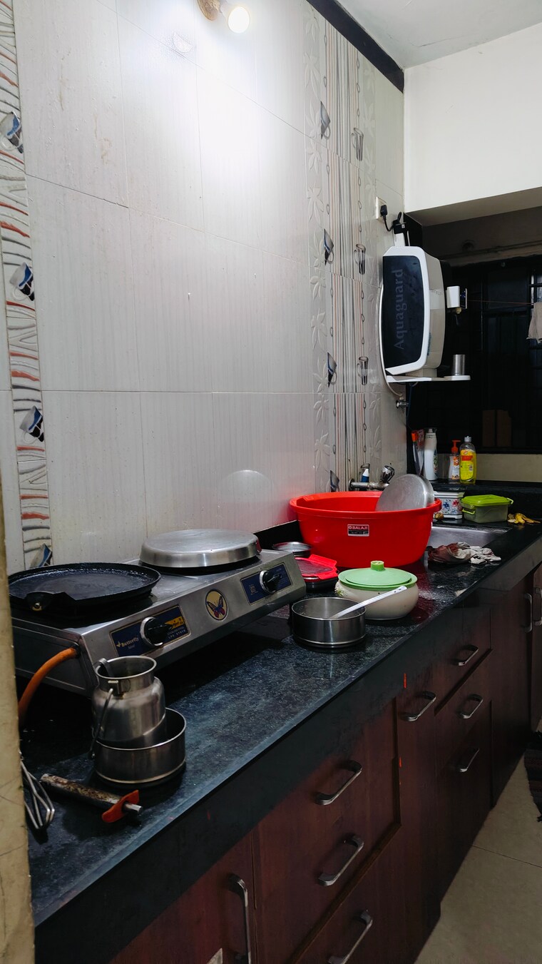 Kitchen, nyati-evolve-1 2 Bedroom 1014 Sq.Ft. Apartment In Magarpatta City Pune 8401068