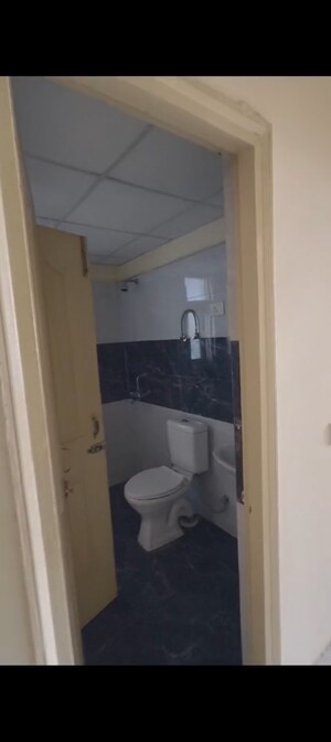 Bathroom in 2 BHK Apartment at SVP Gulmohur Garden, Raj Nagar Extension – for Sale