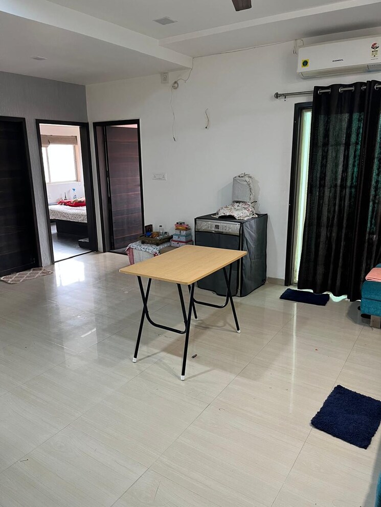 Living Room, sthapatya-pratham-lakeview 2 Bedroom 1550 Sq.Ft. Apartment In Science City Ahmedabad 8401211