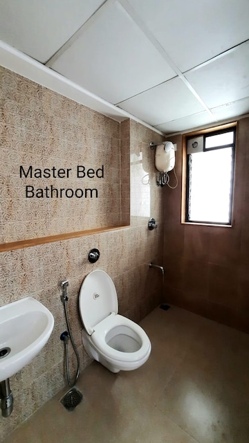 Bathroom in 1.5 BHK Apartment at Lodha Palava City Lakeshore Greens, Dombivli East – for Sale