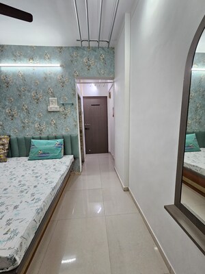 Building Lobby in 2 BHK Apartment at Aakanksha Garden, Manpada – for Sale