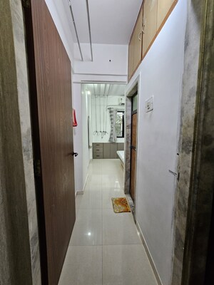 Building Lobby in 2 BHK Apartment at Aakanksha Garden, Manpada – for Sale