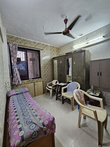 Master Bedroom in 2 BHK Apartment at Aakanksha Garden, Manpada – for Sale